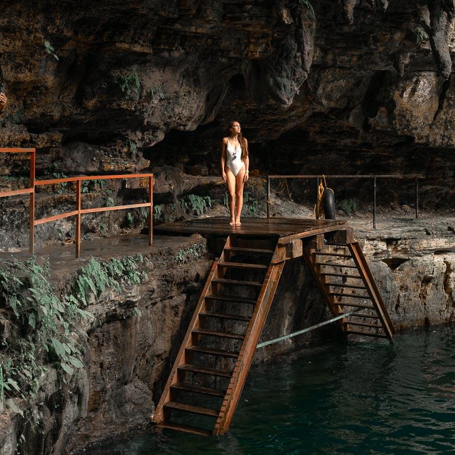 aoife-odwyer standing on pier in cenote